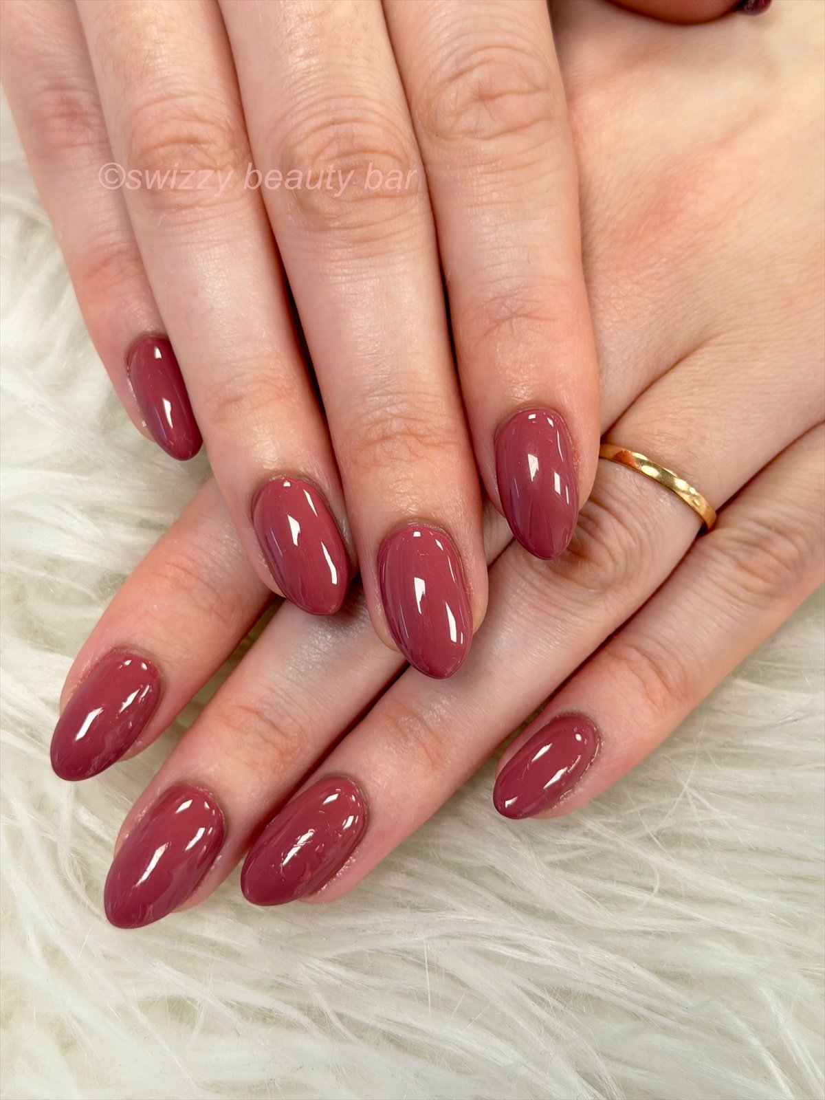 Glossy rose mauve almond gel manicure at Swizzy Beauty Bar, Japanese gel nails Flushing NY