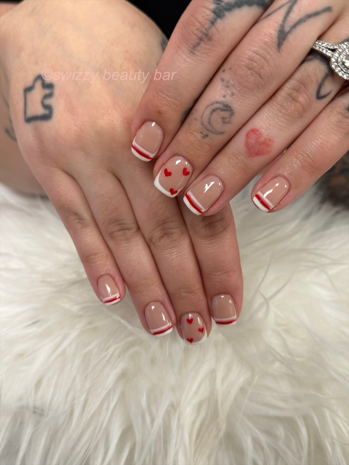 Red Heart French nail art at Swizzy Beauty Bar, Japanese gel nails Flushing NY