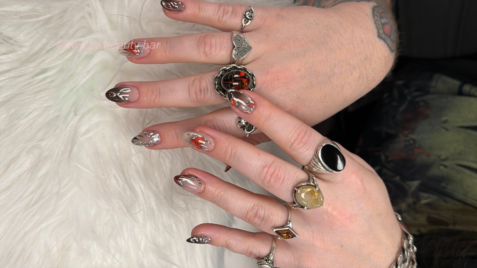 Chrome & Orange Glitter nail art at Swizzy Beauty Bar, Japanese gel nails Flushing NY