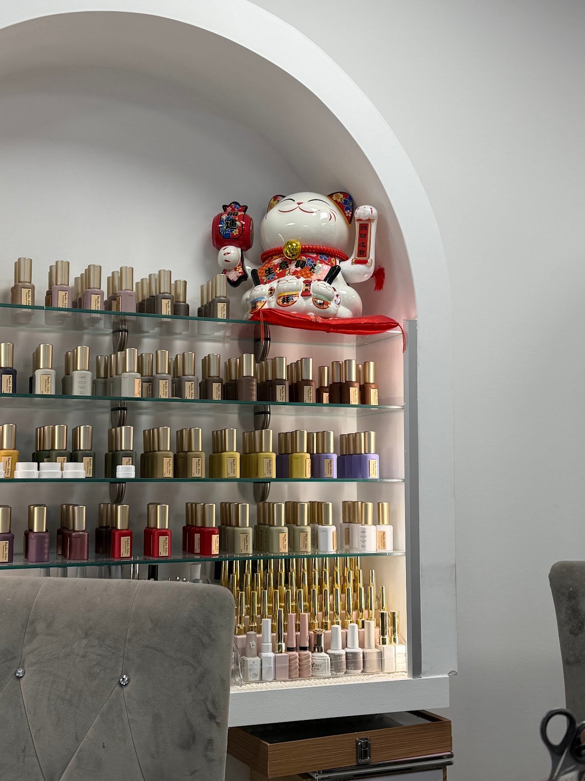 Nail polish display wall at Swizzy Beauty Bar nail salon Flushing